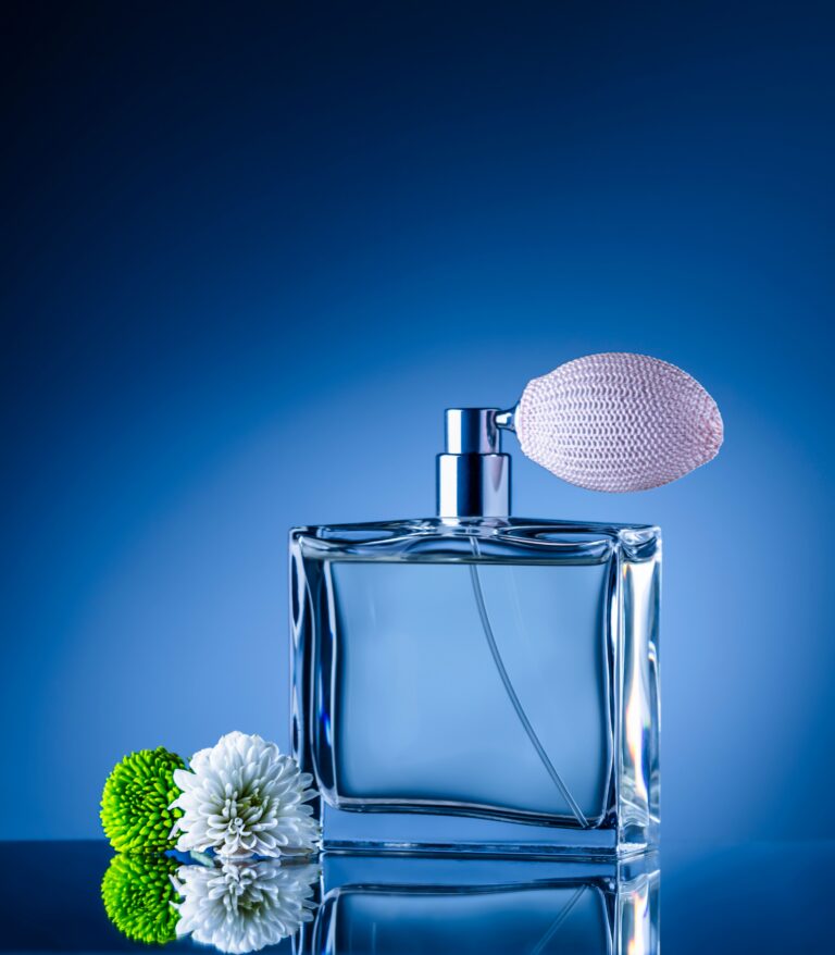 Glass perfume bottle with flowers
