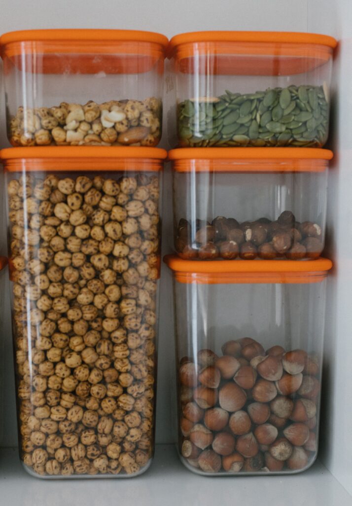 plastic food containers with dried food and nuts