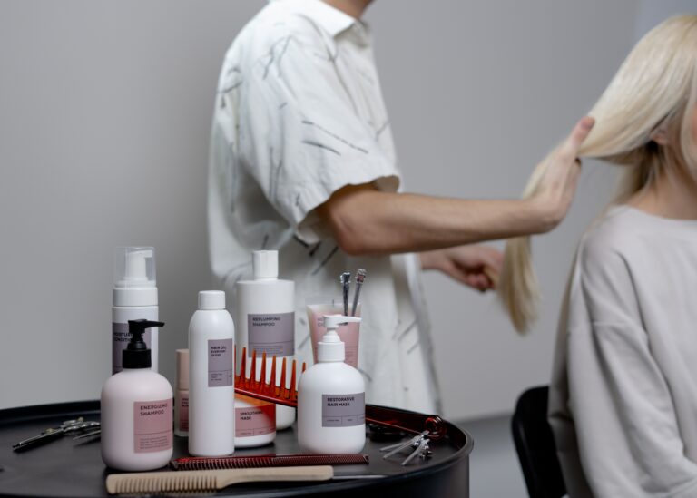hair salon scene with products on side table