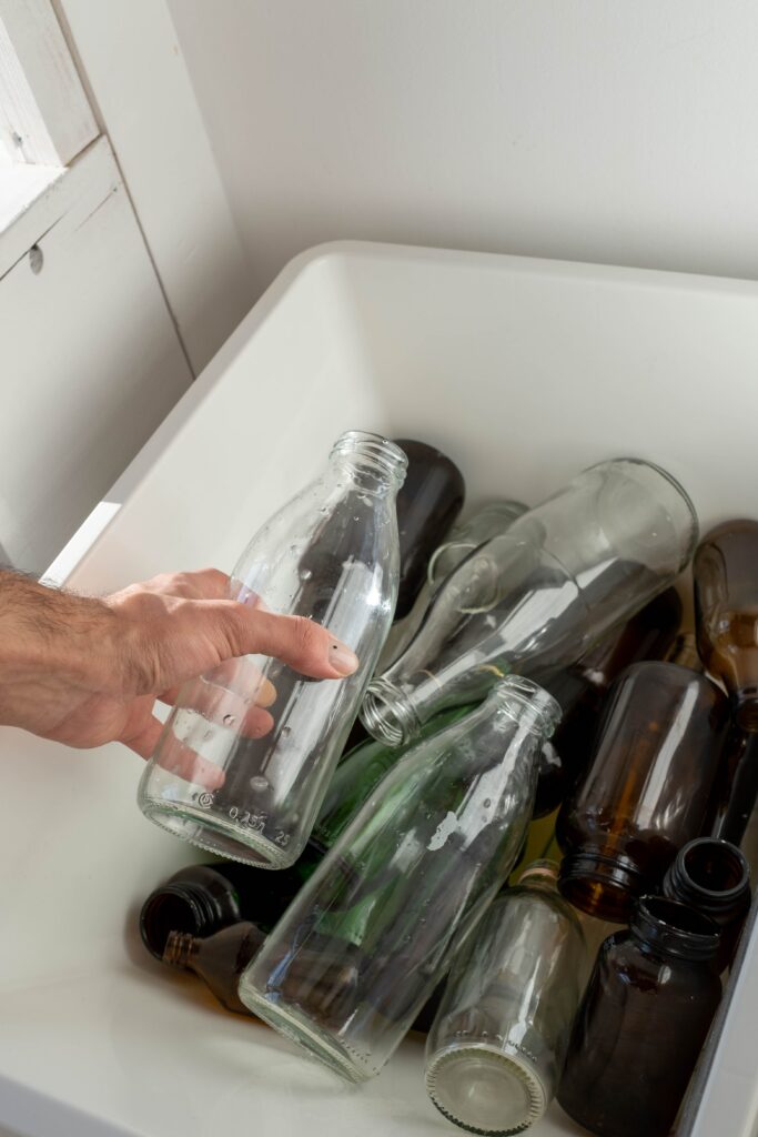 Glass bottles in sink