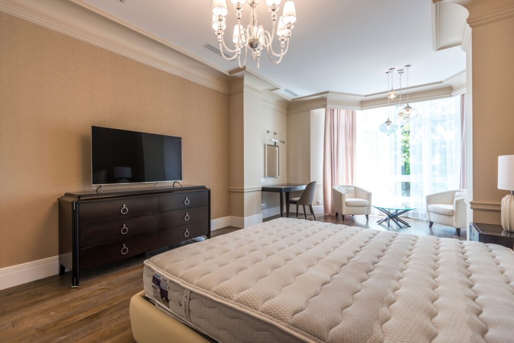 Bedroom with mattress exposed