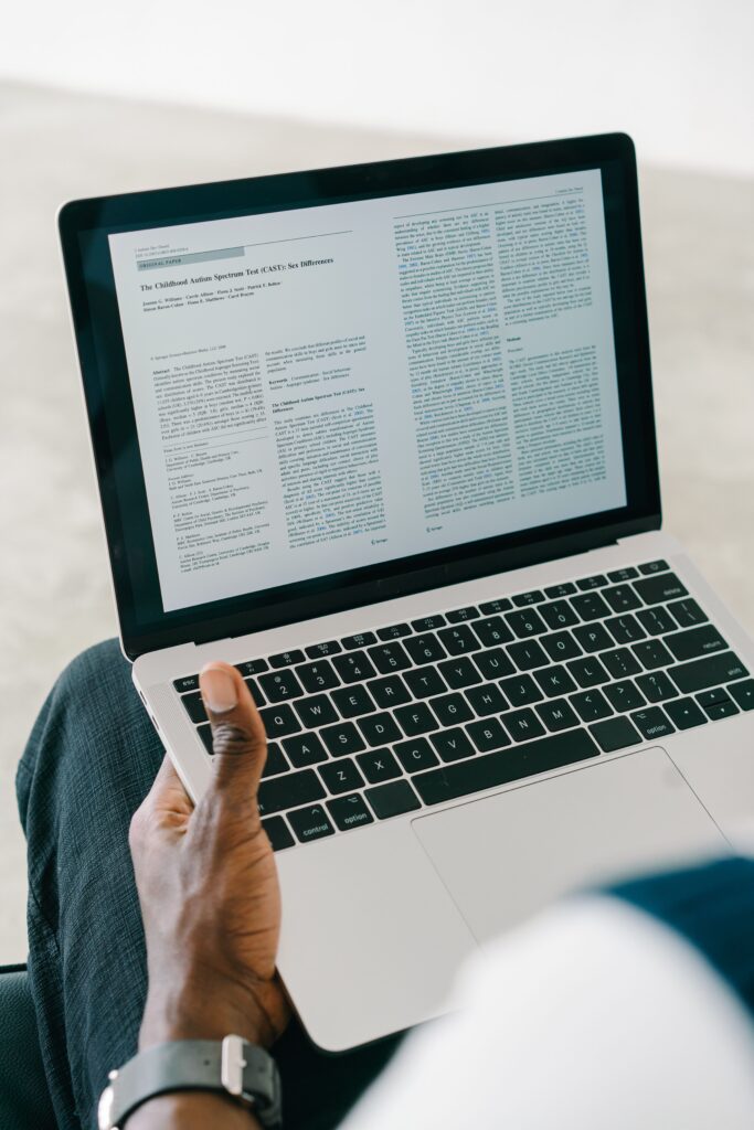 research article open on laptop